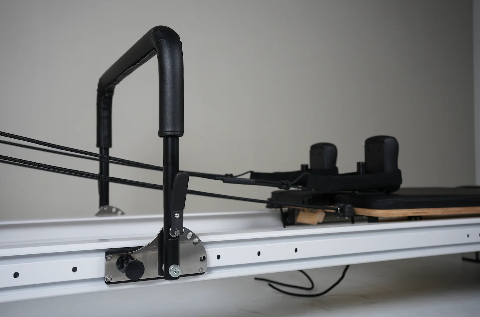Core Collab Full Track Queen Studio Pilates Reformer footbar detail