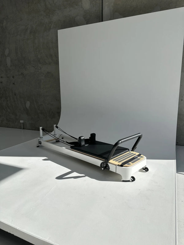 Queen Studio 2.0 Pilates Reformer in Beige by The Core Collab